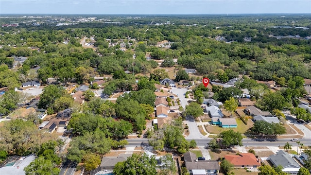aerial view with a forest view and a residential view