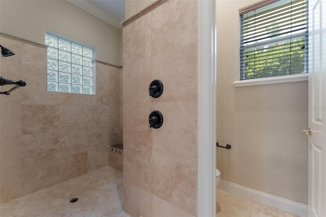 8814 Southern Breeze Dr, Orlando, FL 32836 - bathroom featuring ornamental molding, tiled shower, and tile patterned flooring