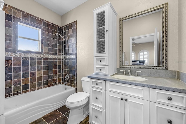 8814 Southern Breeze Dr, Orlando, FL 32836 - full bath featuring bathing tub / shower combination, vanity, and ceiling fan