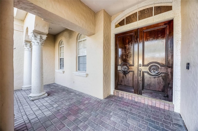 8814 Southern Breeze Dr, Orlando, FL 32836 - doorway to property with stucco siding
