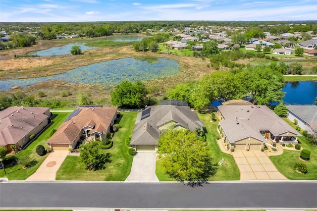 aerial view featuring a residential view and a water view