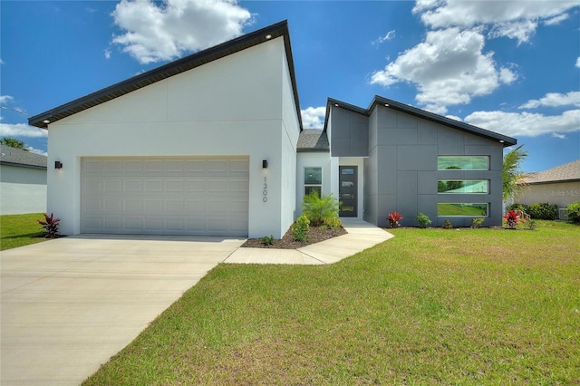 view of front facade with concrete driveway, a front lawn, an attached garage, and stucco siding