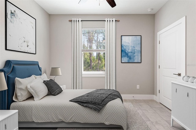 bedroom featuring baseboards