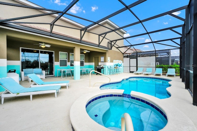 view of pool featuring outdoor dry bar, a patio, and a pool with connected hot tub