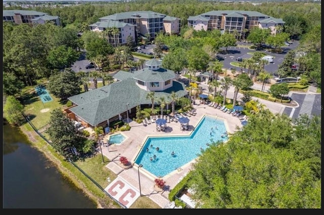 drone / aerial view with a water view