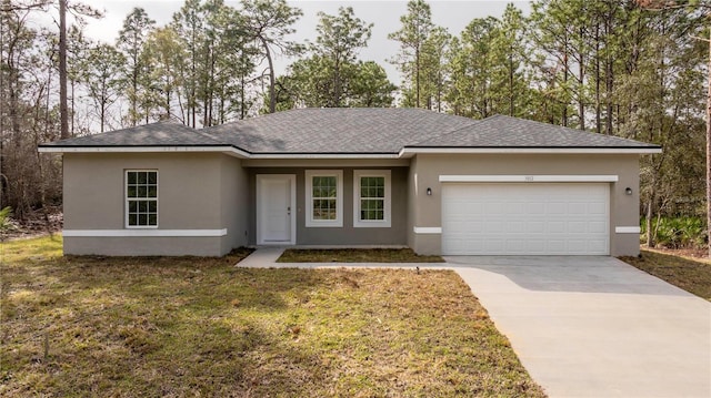 view of front facade with concrete driveway, an attached garage, and stucco siding