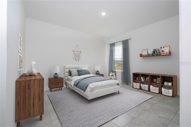 bedroom featuring light tile patterned floors and recessed lighting