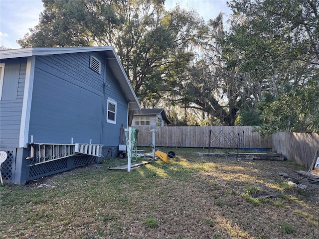 view of yard with fence