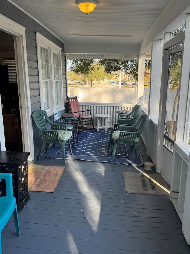 wooden deck featuring a porch