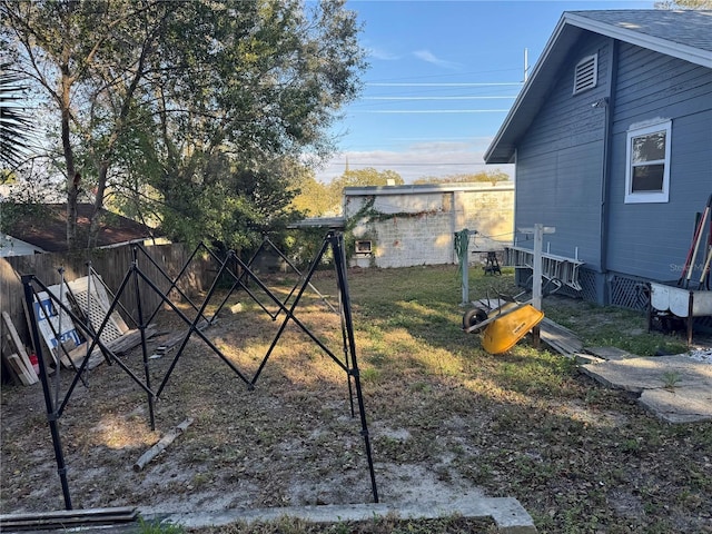 view of yard featuring fence