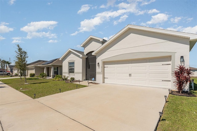 ranch-style home with driveway, a front lawn, stucco siding, a garage, and solar panels