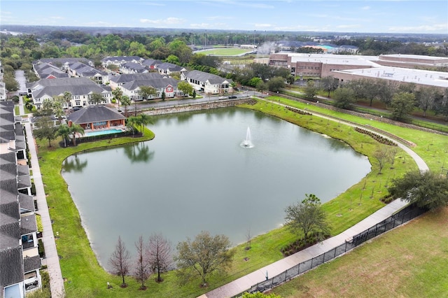 bird's eye view with a residential view and a water view