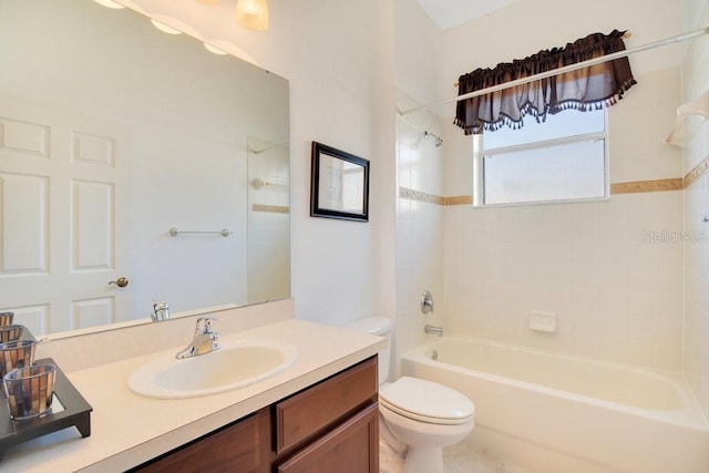 bathroom featuring shower / tub combination, vanity, and toilet