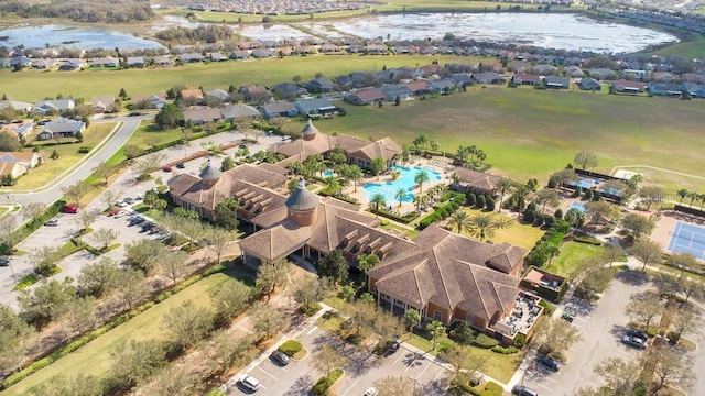 aerial view featuring a water view and a residential view