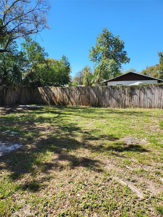 view of yard featuring fence