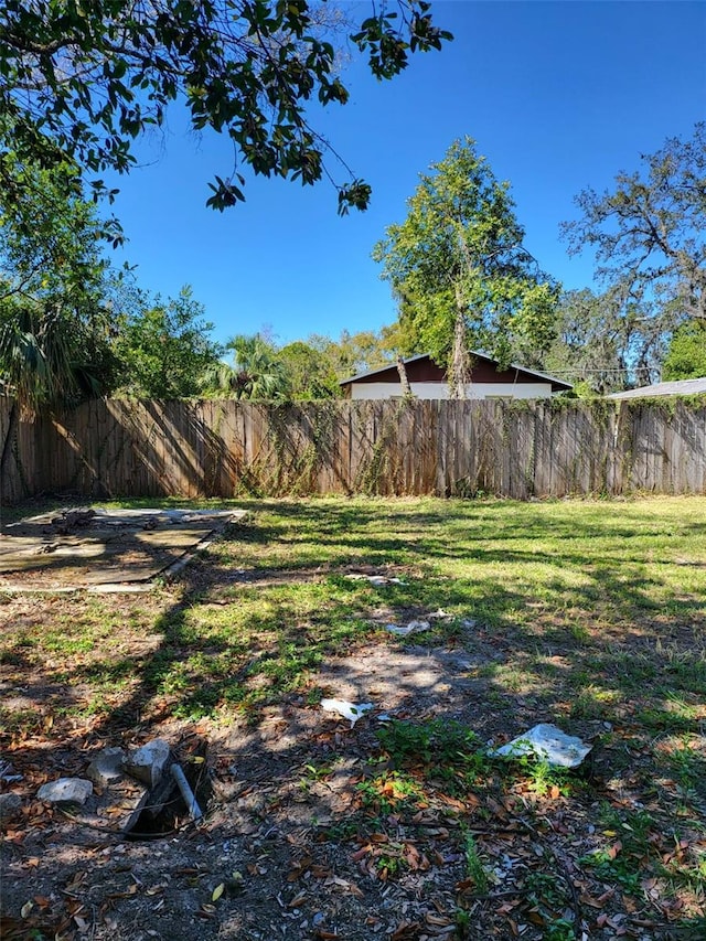 view of yard with fence