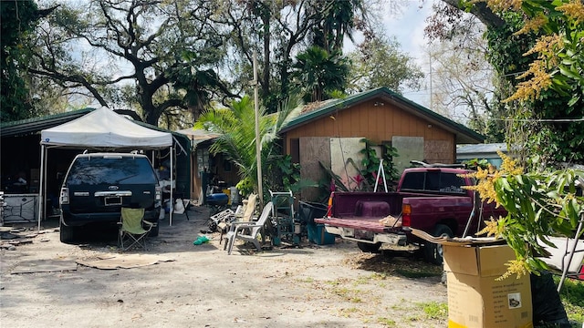 exterior space with a carport