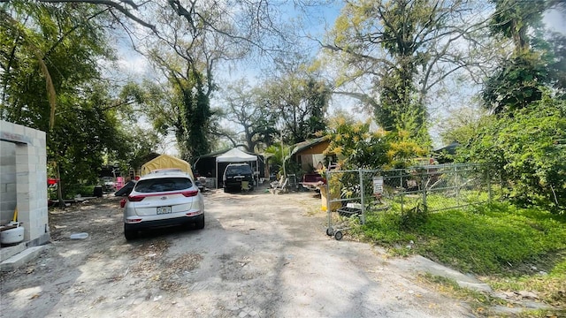 view of road featuring a gated entry