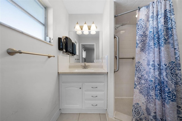 bathroom with tile patterned flooring, vanity, and a shower with shower curtain