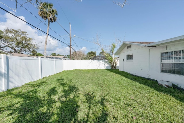 view of yard with a fenced backyard