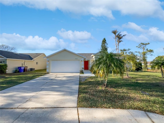 single story home featuring a garage, driveway, a front lawn, and central AC unit