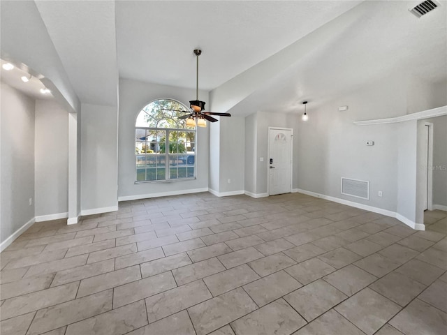 unfurnished dining area with baseboards, visible vents, and a ceiling fan