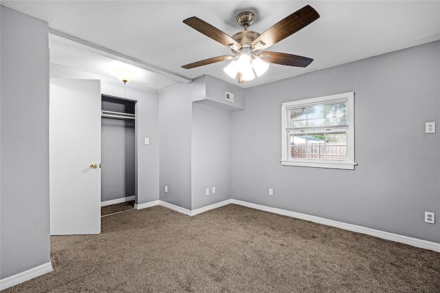 1622 Dolphin Dr, Saint Cloud, FL 34771 - unfurnished bedroom with carpet floors, a closet, visible vents, ceiling fan, and baseboards