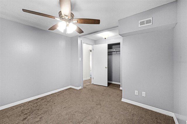 1622 Dolphin Dr, Saint Cloud, FL 34771 - unfurnished bedroom featuring baseboards, a closet, visible vents, and carpet flooring