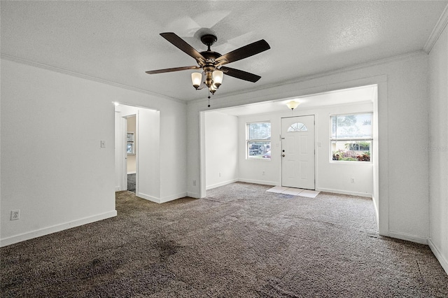 1622 Dolphin Dr, Saint Cloud, FL 34771 - interior space featuring a textured ceiling, ornamental molding, carpet, and baseboards
