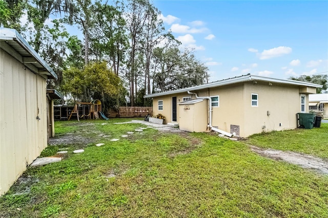 1622 Dolphin Dr, Saint Cloud, FL 34771 - view of yard with fence and a playground