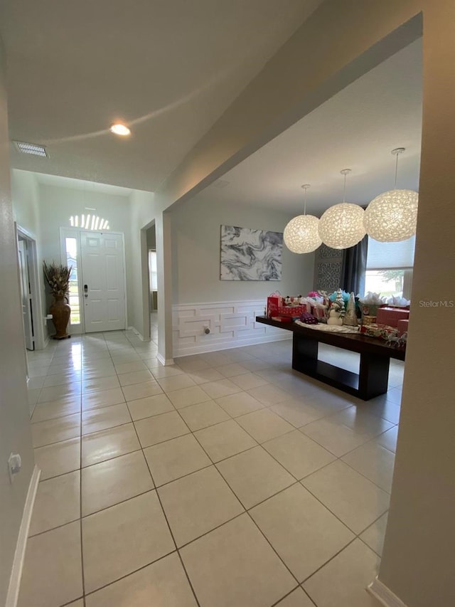 entryway featuring recessed lighting, visible vents, and light tile patterned floors