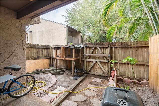 view of patio / terrace featuring fence