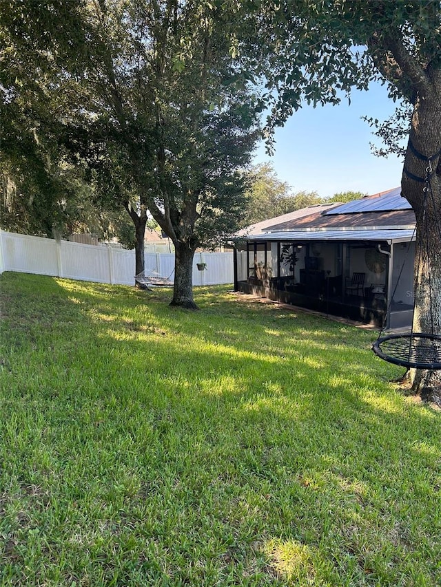 view of yard with fence