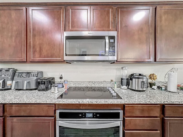 kitchen with appliances with stainless steel finishes