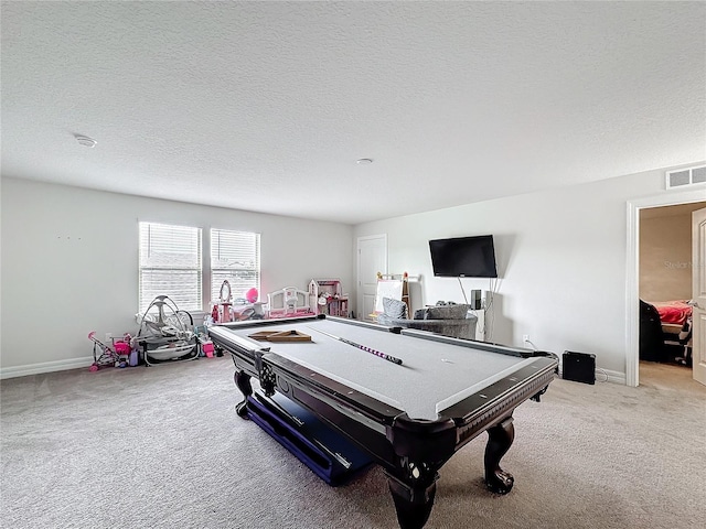 rec room with pool table, visible vents, light carpet, a textured ceiling, and baseboards