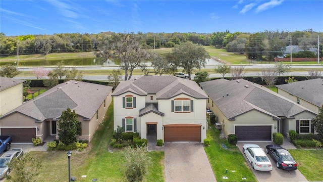 aerial view with a residential view and a water view