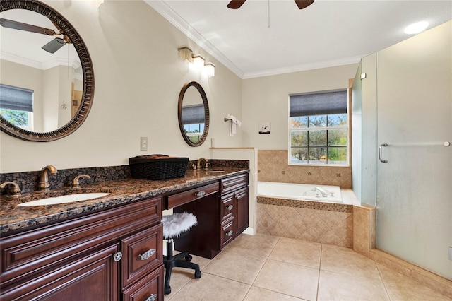 full bathroom with a sink, a bath, and crown molding