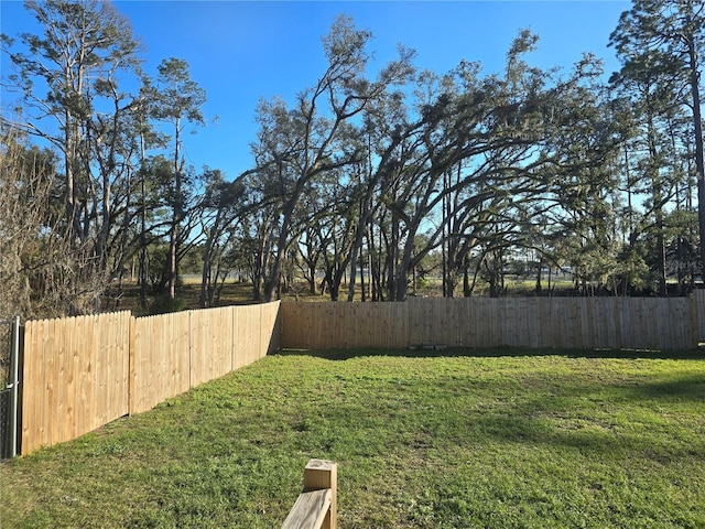 view of yard featuring fence