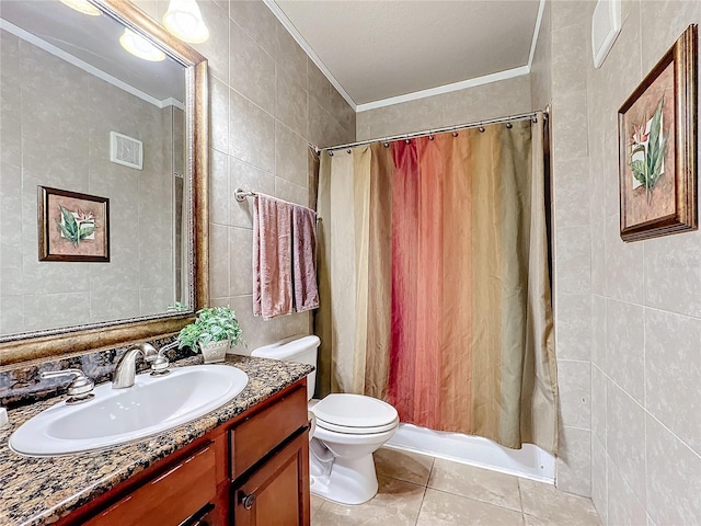 bathroom with crown molding, tile walls, and tile patterned floors