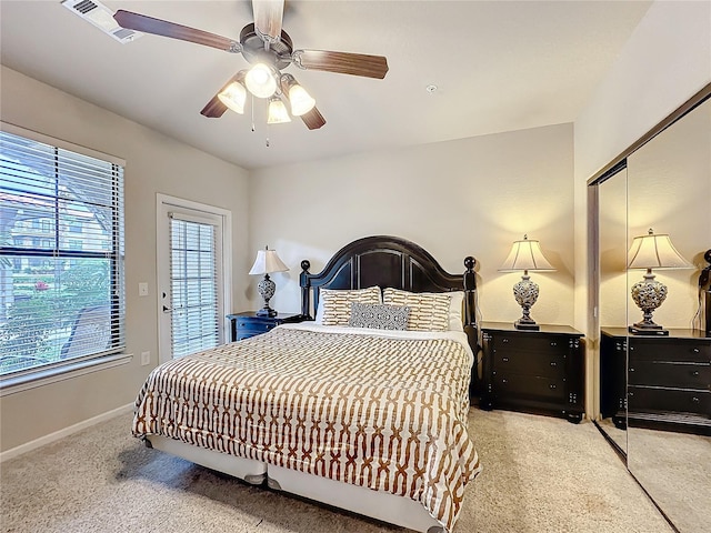 bedroom featuring a closet, visible vents, ceiling fan, and baseboards