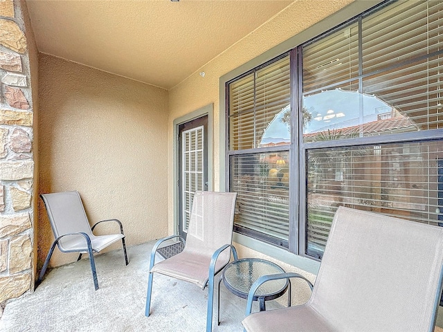 view of patio / terrace with a balcony