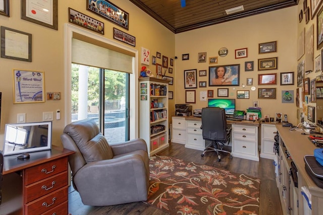5719 Emerson Pointe Way, Orlando, FL 32819 - office with dark wood-type flooring and crown molding