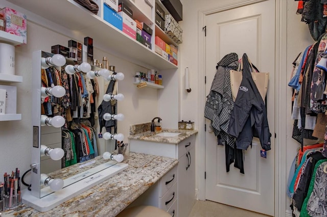 5719 Emerson Pointe Way, Orlando, FL 32819 - mudroom with a sink