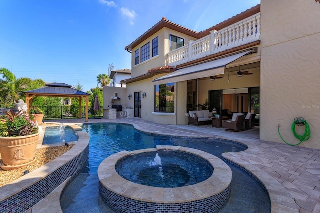 5719 Emerson Pointe Way, Orlando, FL 32819 - view of swimming pool featuring ceiling fan, a patio, outdoor lounge area, fence, and a gazebo