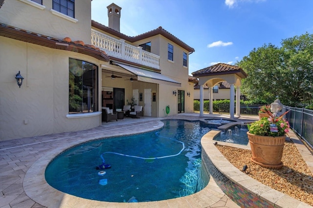 5719 Emerson Pointe Way, Orlando, FL 32819 - view of swimming pool featuring a ceiling fan, fence, a gazebo, and a patio