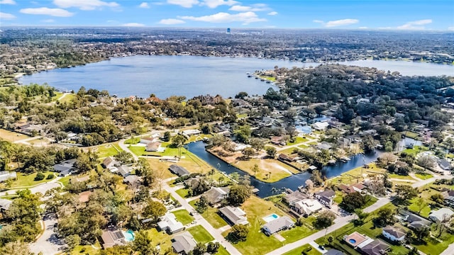 aerial view with a water view and a residential view