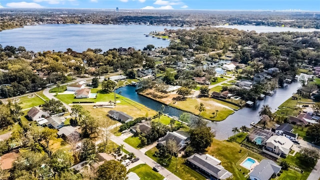 aerial view with a residential view and a water view