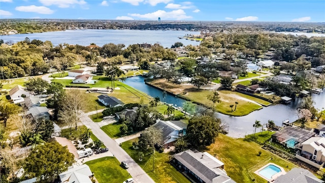 drone / aerial view with a water view