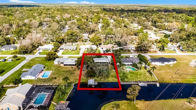 birds eye view of property with a residential view