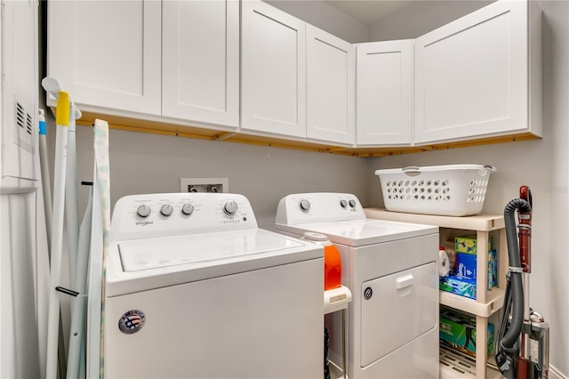 laundry area with cabinet space and washer and dryer